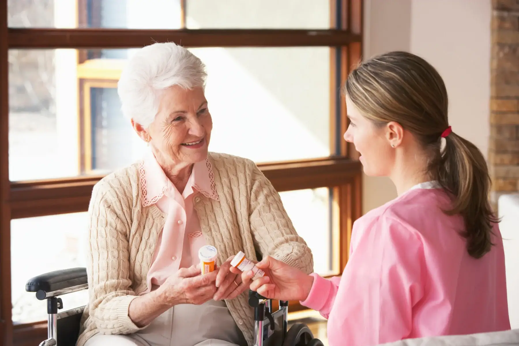 Care worker sharing a calm moment with an older person